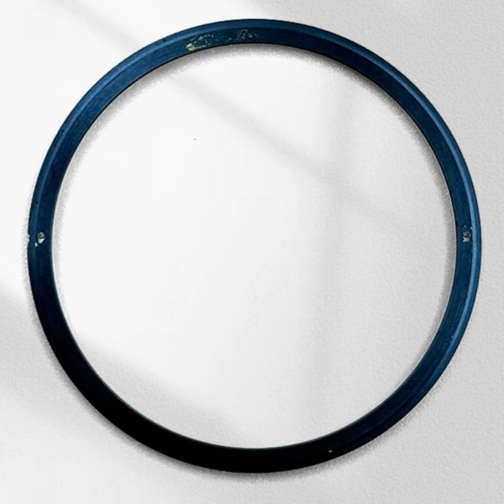 Black stainless steel chapter ring for watch repair, 34.9mm x 31.0mm x 1.9mm.