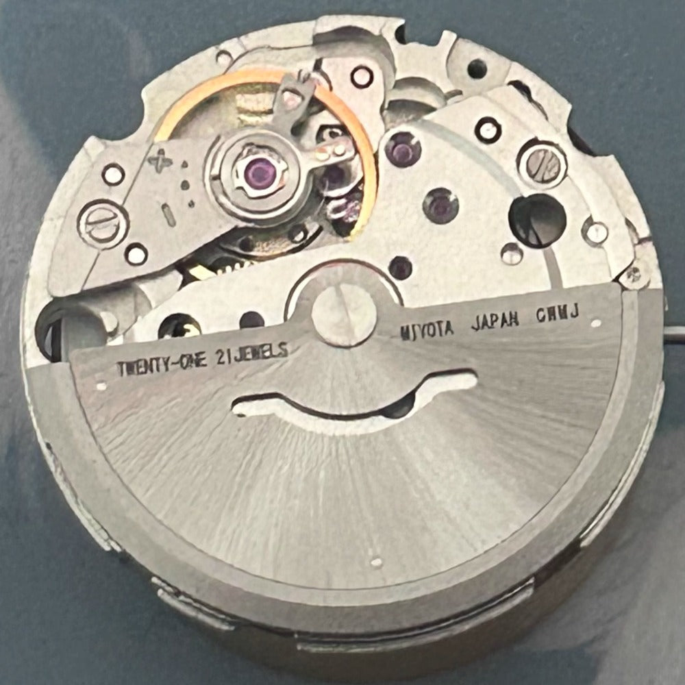 Citizen watch accessory with Japan-made 8205 mechanical movement, 3 hands, and day-date display at 3 o'clock.