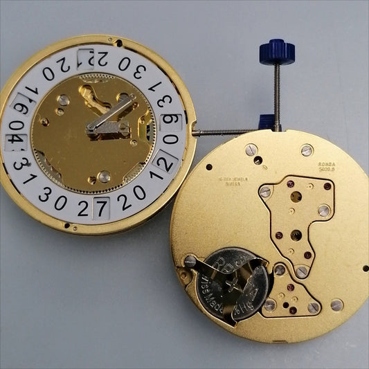 Swiss Made Ronda 5020.B quartz movement for golden watch repairs and upgrades.