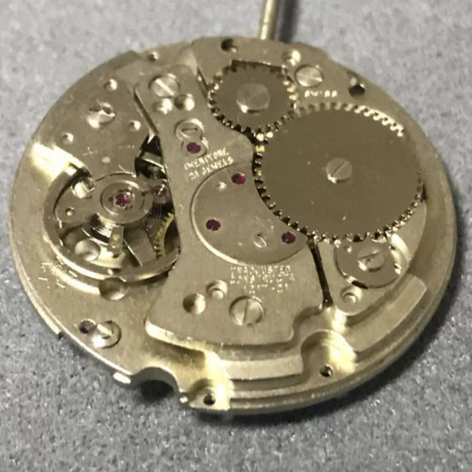 Swiss Made RONDA MATIC 1217-21 manual winding watch movement, disassembled components detailed.
