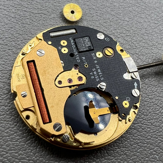 Swiss ETA255.412 quartz watch movement with 3 hands and white dial, precision craftsmanship by ETA.