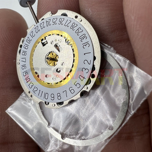 Ronda 705 quartz watch movement with date at 6, Swiss parts for precise timekeeping.