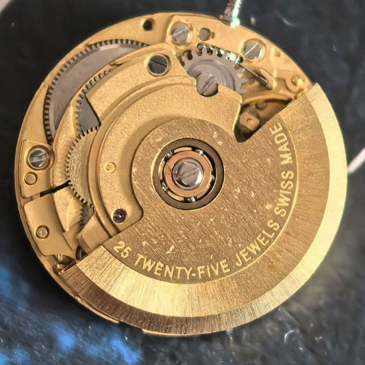 Swiss Made SW100 mechanical watch movement part for precise repair and reliable performance.
