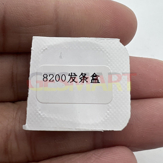 Silver barrel with complete mainspring for Miyota 8200 8215 watch movement, high-quality generic replacement part.