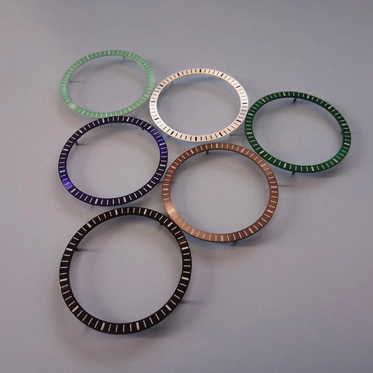 Mod Watch Accessories chapter ring in black, silver, blue, and green for Japanese NH70 movement, 28.5x24.5mm.