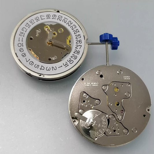 Swiss Part Ronda 5030.D quartz watch movement with white dial and date display at 3 o'clock.