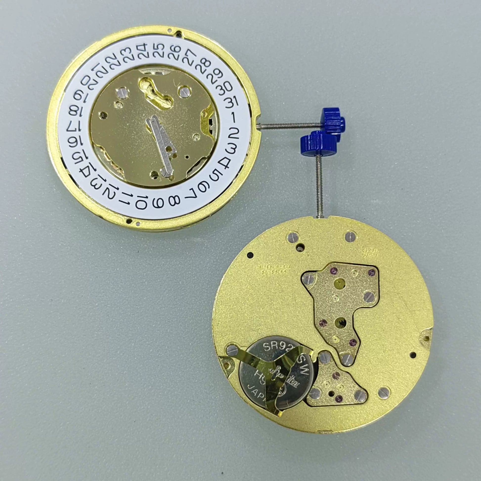 Swiss Made Ronda 5021.D quartz watch movement with date at 4 on white disk