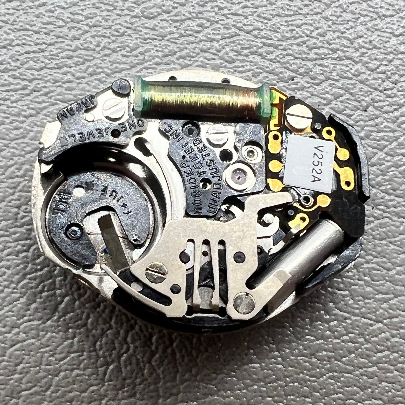 Japan Morioka Tokei V252A quartz watch movement with 2 hands and small second, precise timekeeping.