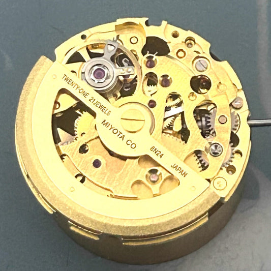 Golden Miyota 8N24 hollow mechanical watch movement by Japan Made, precise craftsmanship for timepiece repair or customization
