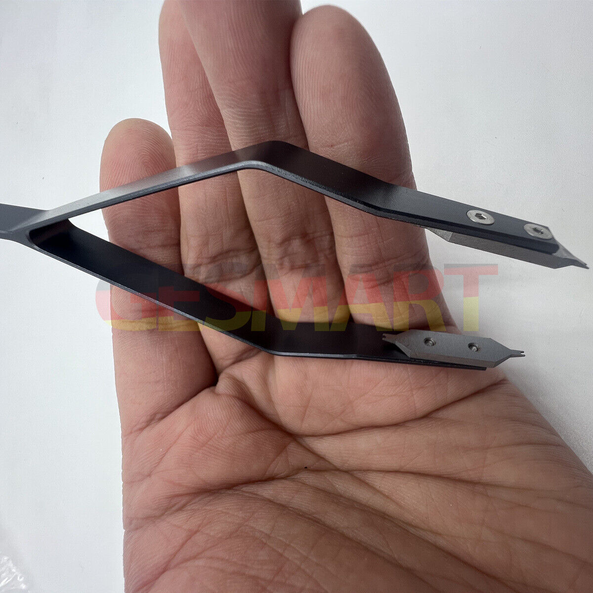 Precision stainless steel 7825 V type watch spring bar tweezers, ideal for delicate watch repair and adjustments.