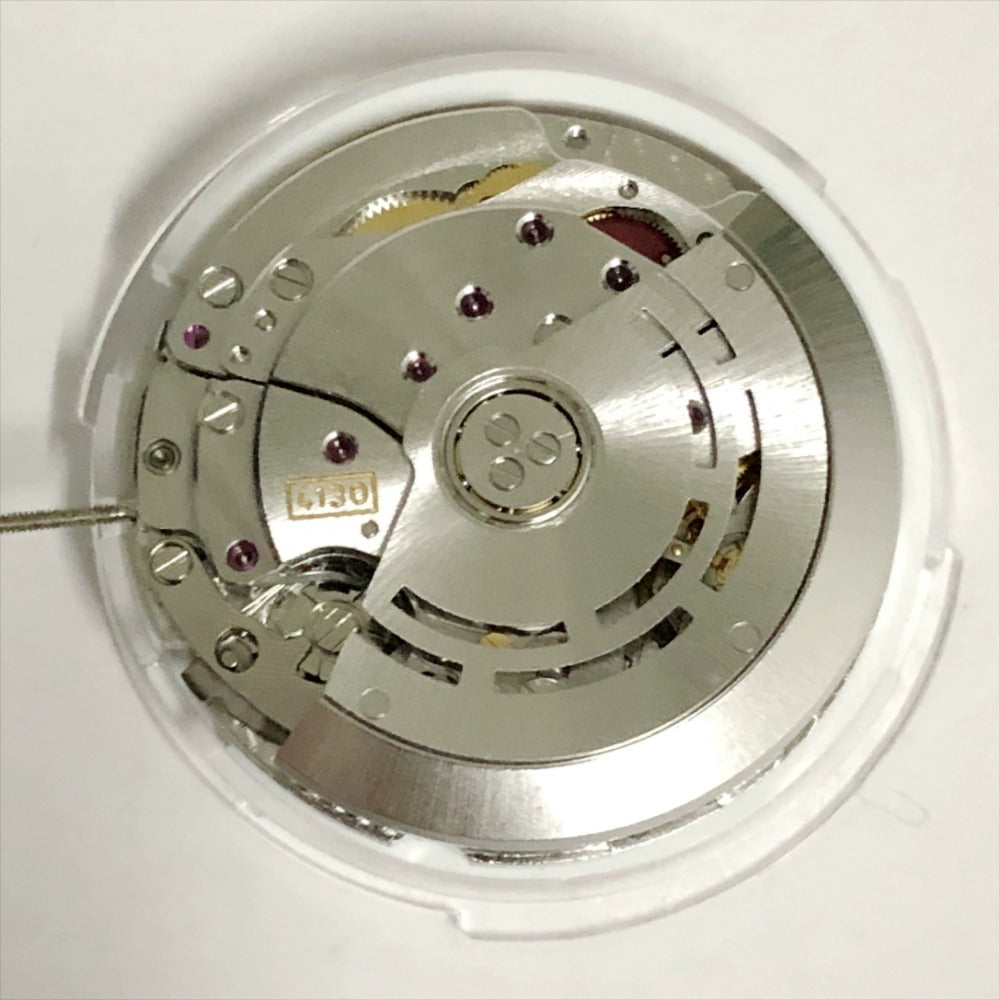 Shanghai 4130 automatic watch with small seconds at 3, 6, 9 o'clock, precision China-made timepiece.