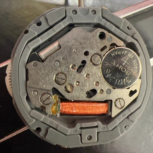 Miyota 6P21 quartz watch movement with five hands featuring small seconds at 9 and 12 o'clock positions