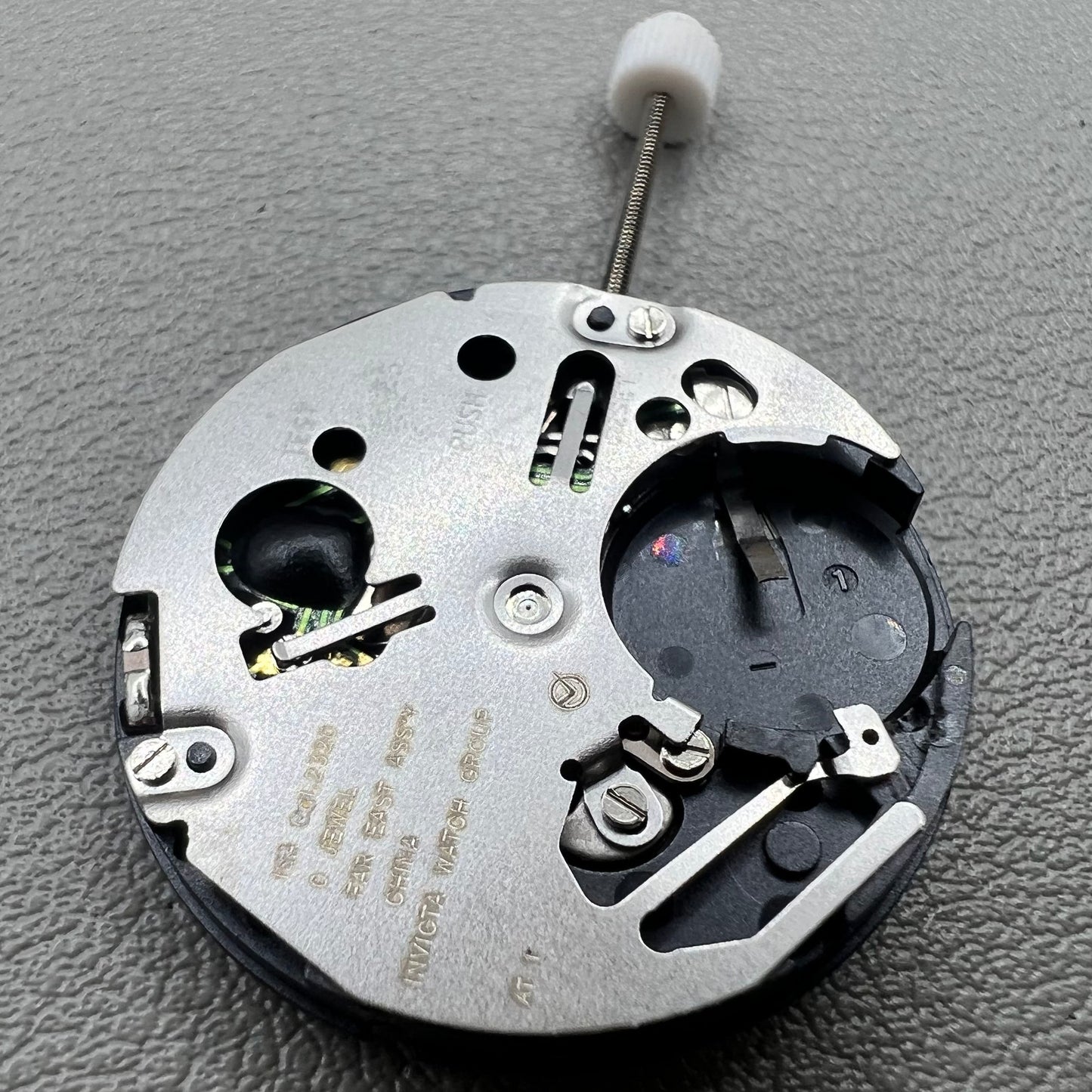 Swiss ISA 2320 watch accessory with white dial, quartz movement, date display at 3 o'clock by Swiss brand.
