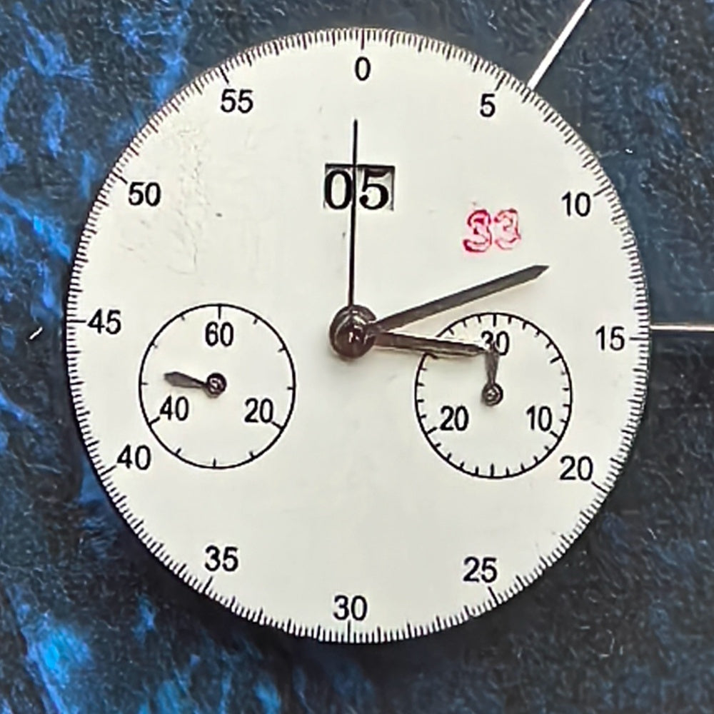 Chinese Dandong 7750 mechanical watch movement with big date at 12 and small second at 4/8, precision timepiece.