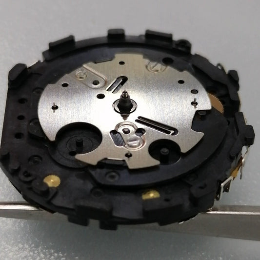 Japan Made VR31 quartz watch movement showing small second subdial at 3, 6, and 9 o'clock positions for precise timekeeping.