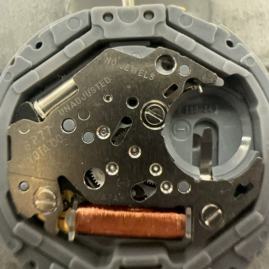 Japan Miyota 6P77 quartz watch movement featuring small second hands at 6, 9, and 12 o'clock positions for precise timekeeping.
