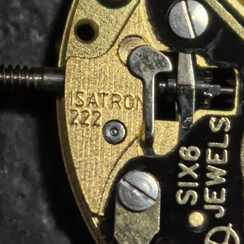 Swiss ISA 222 quartz watch part with two hands, no calendar, for accurate time repairs and maintenance.