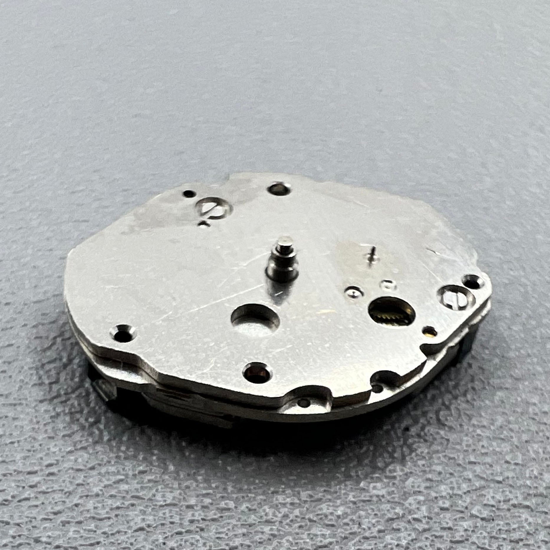 Japan Morioka Tokei V252A quartz watch movement with 2 hands and small second, precise timekeeping.