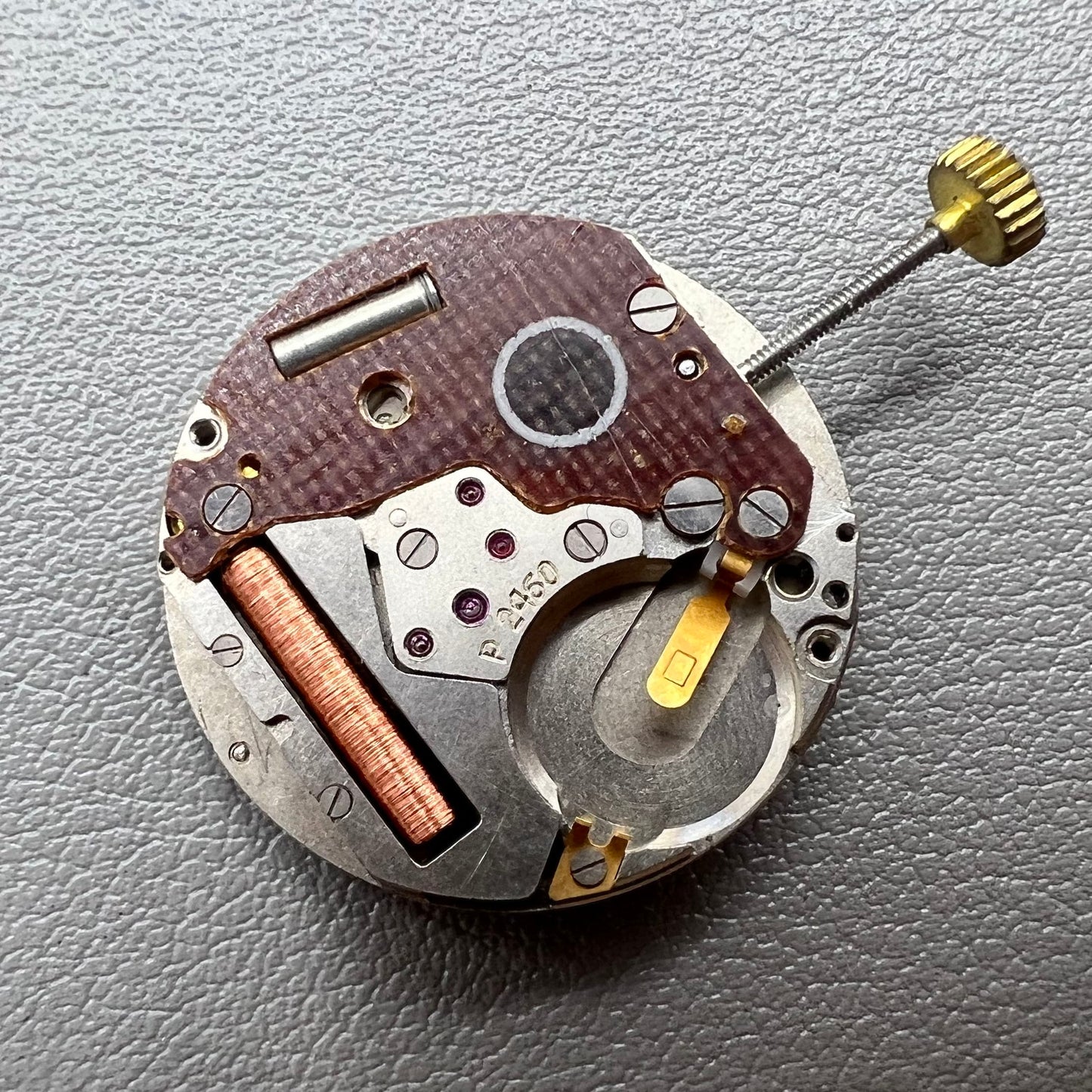 Swiss P-2460 quartz watch movement with 3 hands, precise timekeeping for watch repairs and accessories.