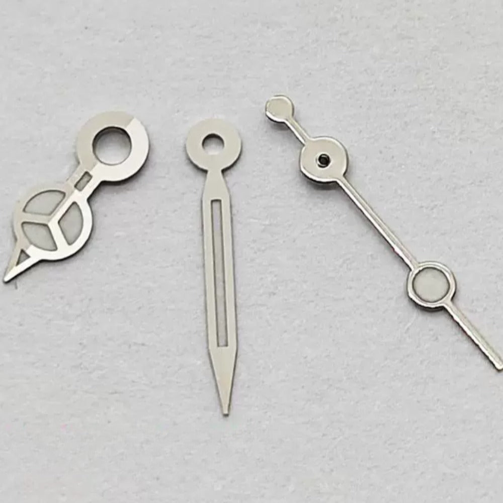 Silver-trimmed green lume watch hands set for NH05 NH06 movement, perfect for precise timekeeping.