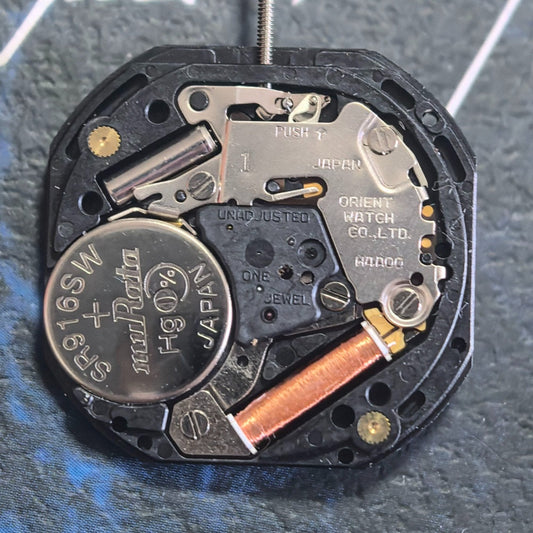 Orient Japan watch with H4A00 Quartz movement, small seconds at 2, 6, and 10 o'clock, stylish design.