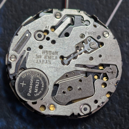 Citizen H504 eco-drive quartz watch movement with date at 4 o'clock, Japan made, solar-powered part.