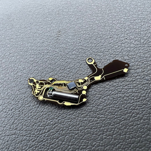 Hattori VR33 quartz movement circuit board for precise watch accessory repair and replacement.