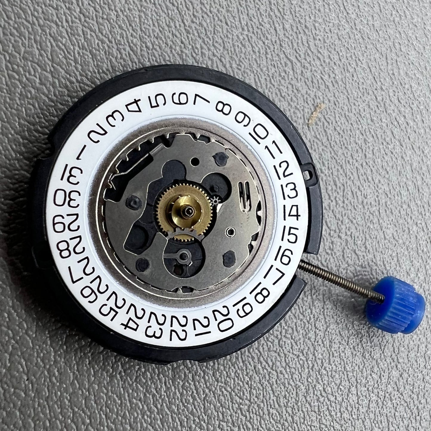 Swiss ETA 804.111 quartz movement with 3 hands, precision watch accessory for repairs and upgrades.
