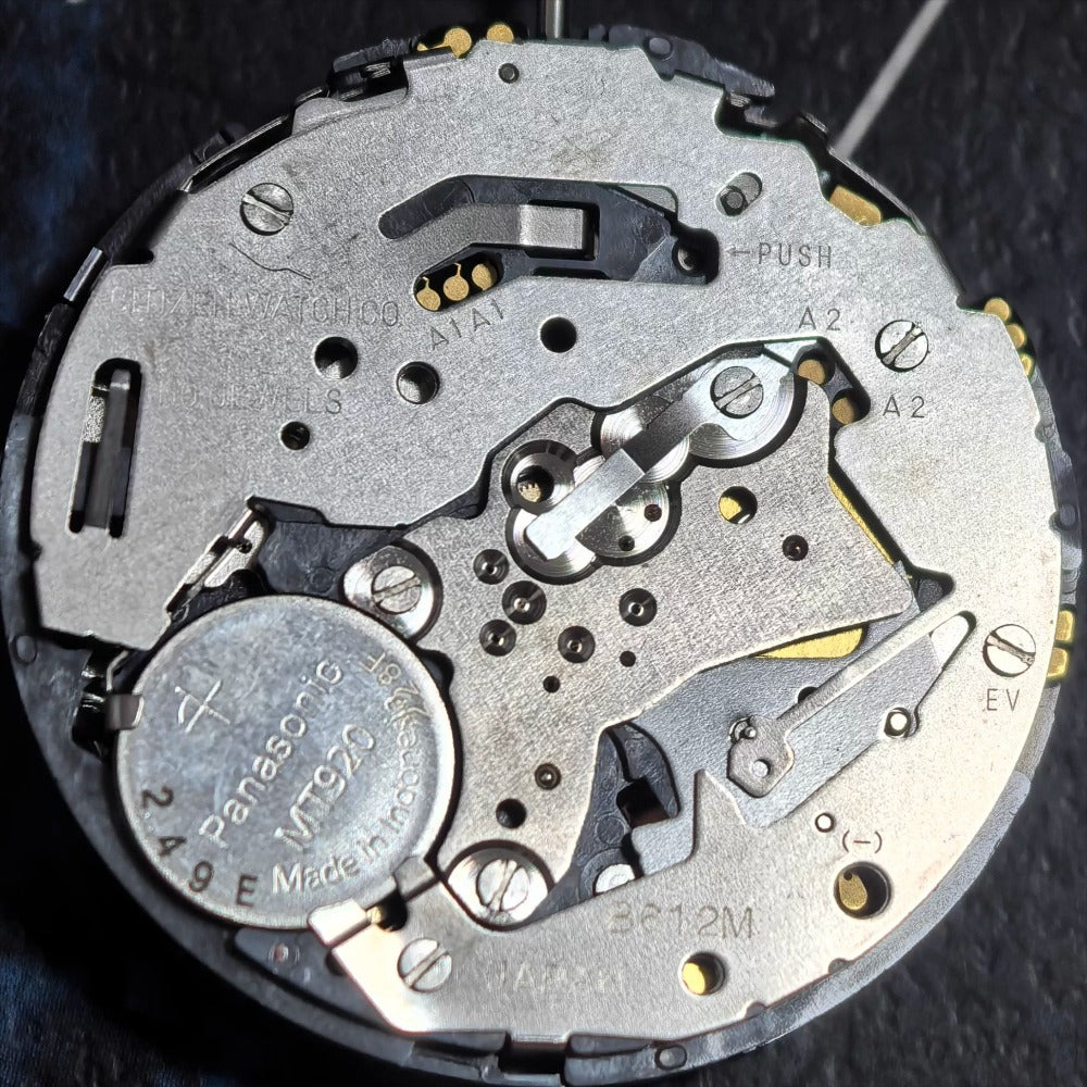 Citizen B612M solar watch with 6 hands, small second subdial at 6, 9, and 12 o'clock positions.