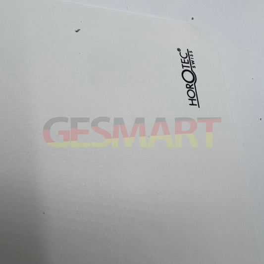 Horotec MSA24.207 white self-adhesive watchmaker bench mat, 350x240mm for precise workspace protection.
