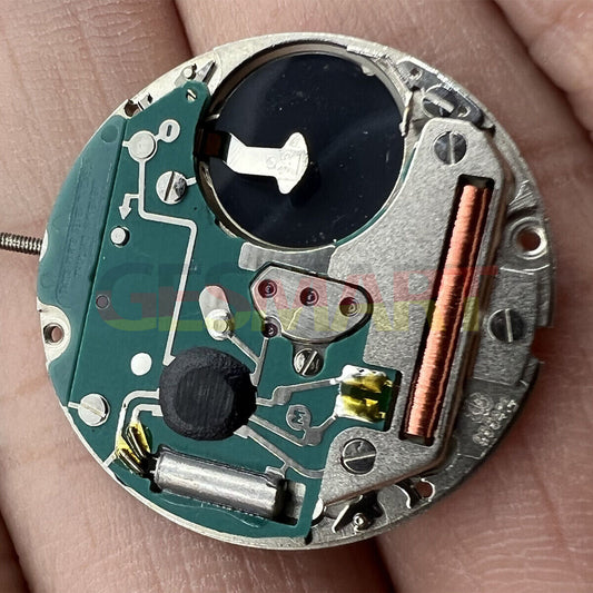 ETA 955.414 Swiss Made quartz watch movement with date display at 3 o?clock, precision timekeeping.