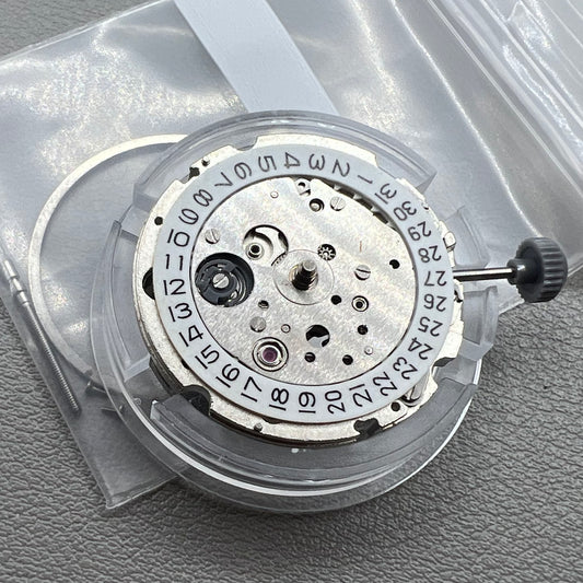 Japan Miyota 8218 automatic watch movement with date at 9 o'clock and two hands, precision timekeeping.