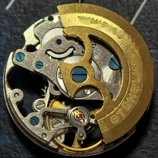 China Made Hollow 7120 mechanical watch part with golden rotor for precise timekeeping.