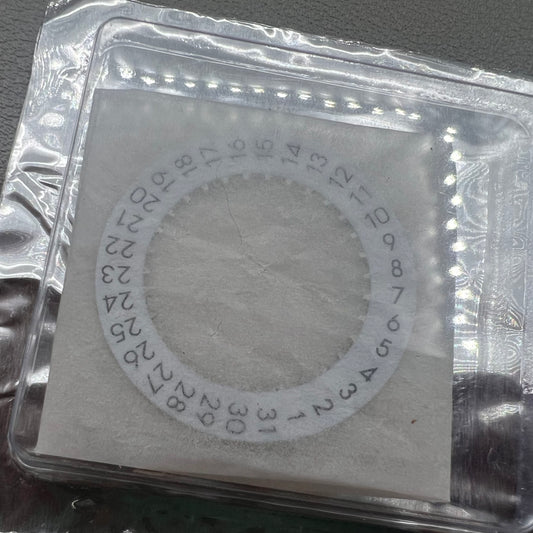 Original Swiss Omega 8500A Quartz movement date disk wheel for precise watch repair and maintenance.