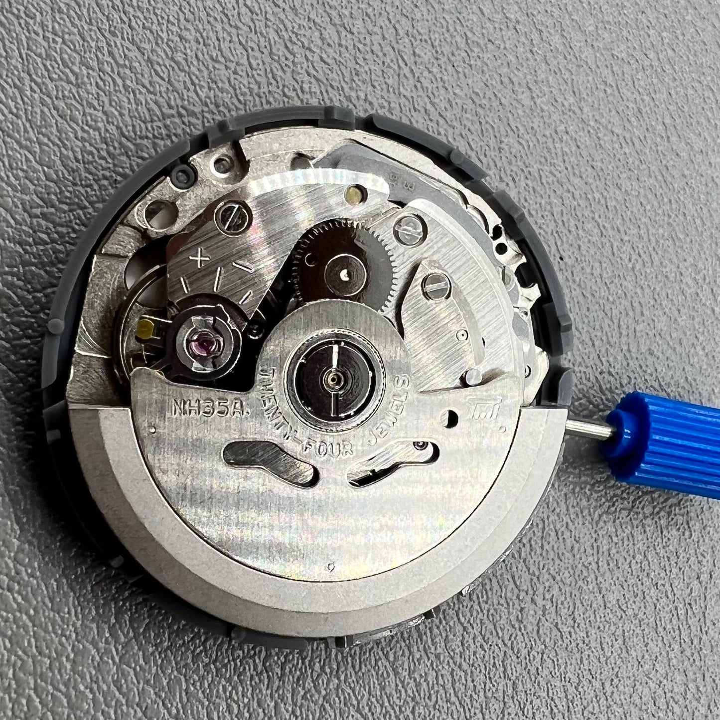 Seiko NH35 automatic watch movement displaying special font details with high accuracy craftsmanship.