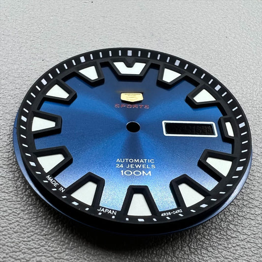 35mm green luminous watch dial with blue accents for NH36 movement, designed for easy readability in low light.