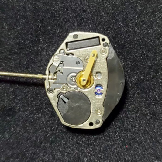 Close-up of Swiss Part ETA 902.105 quartz movement for precise watch repair by Swiss Part.