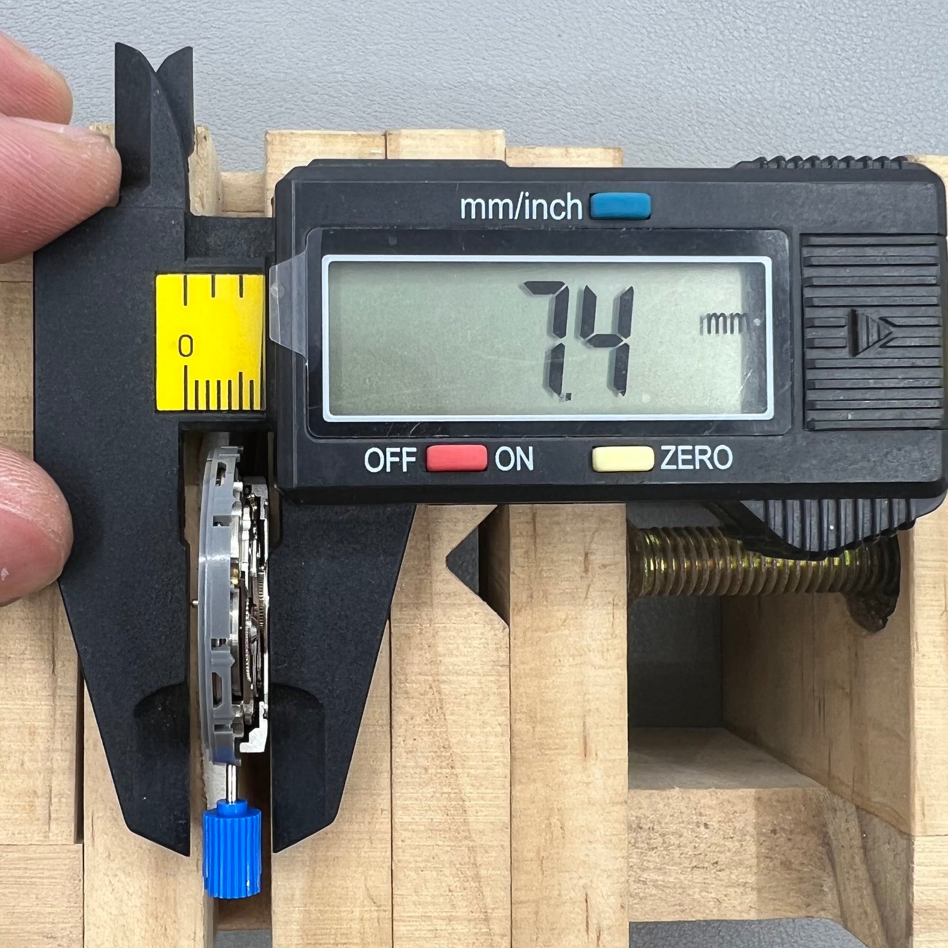 Seiko NH35 automatic watch movement with dark yellow disk, precise mechanical timekeeping by Japan.