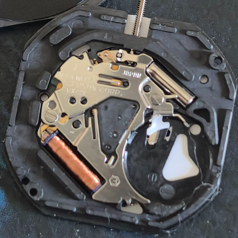 Japan Made Epson VX42.E quartz watch part with white disk and 3 hands for precise timekeeping
