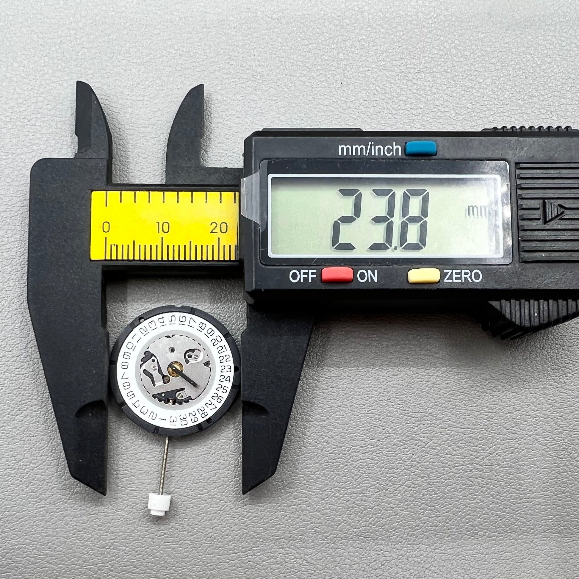 Swiss ISA 2320 watch accessory with white dial, quartz movement, date display at 3 o'clock by Swiss brand.