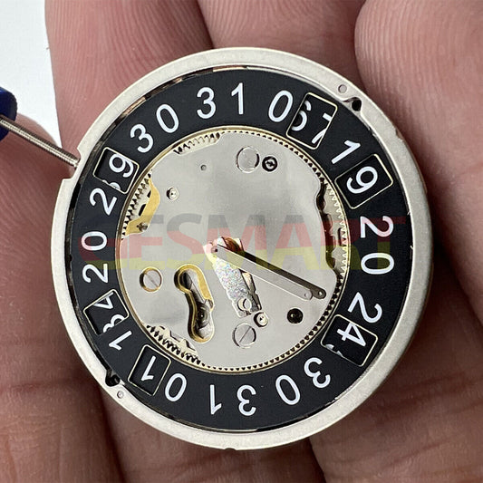 Ronda 5040B Swiss quartz watch movement with black date wheel, precision timekeeping for watch repairs.