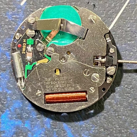 Swiss ISA 1198 quartz movement watch part featuring day, date, and moon phase functions for precise timekeeping.