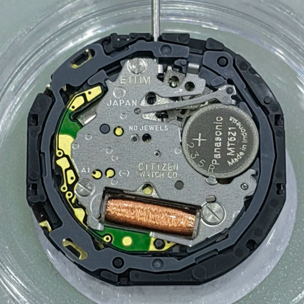 E111 solar watch movement with single calendar at 3 o'clock, Japanese precision for watch repairs.