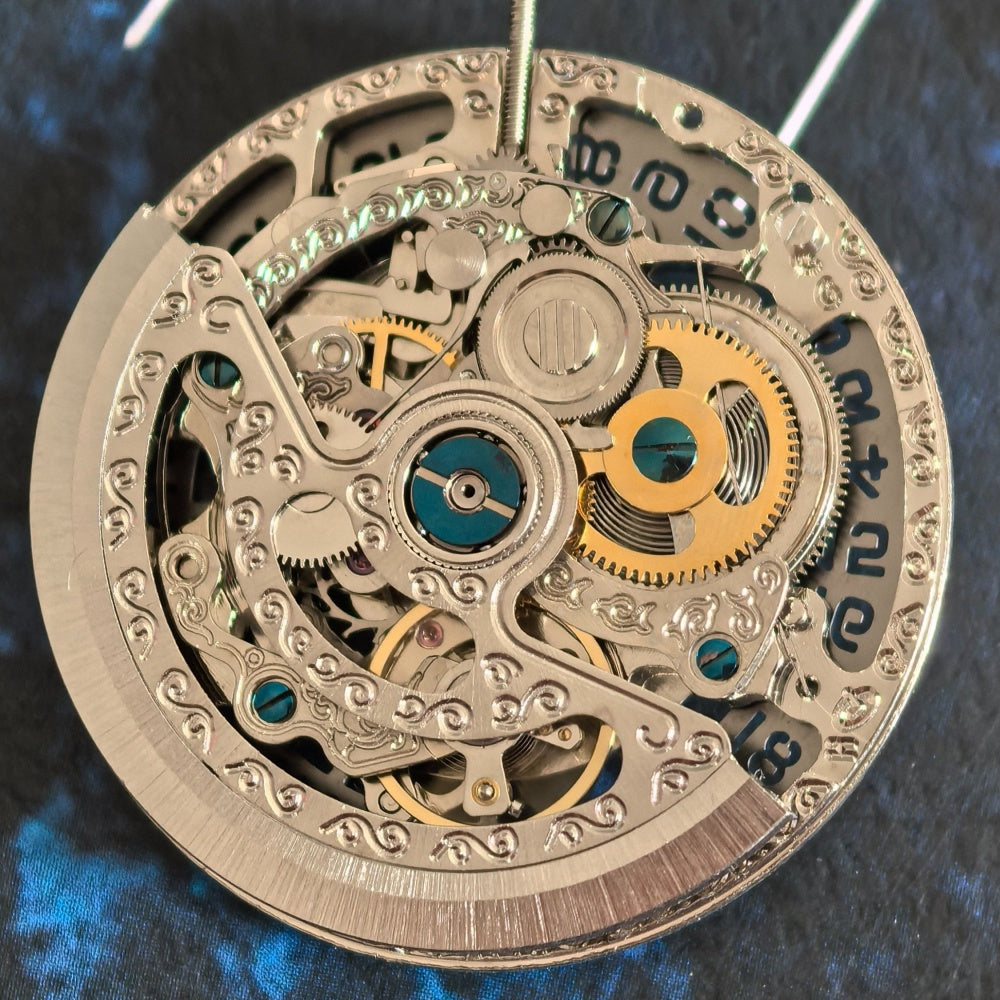 Silver hollow mechanical watch part with single calendar from Chinese Hangzhou 2189, ideal for watch repairs and customization.