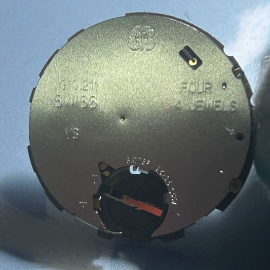 Swiss Made G10.211 quartz movement with 6 hands and date at 4 o'clock for watch repair parts.