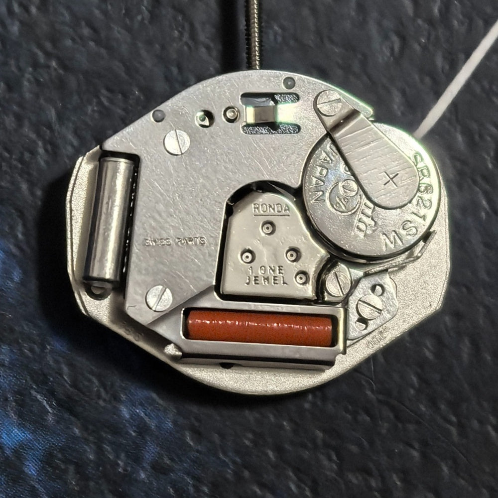 Precise Swiss Part Ronda 763 quartz movement with 3 hands, no calendar, ideal for watch repairs.