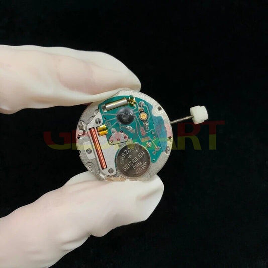 ETA 955.124 Swiss quartz day-date watch movement for precise repairs and replacements.