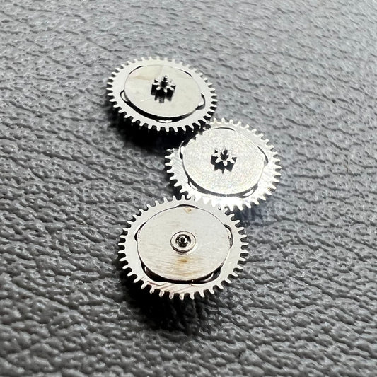 Set of 5 silver reversing wheels for Shanghai 7120 movement, compatible with China-made watches.