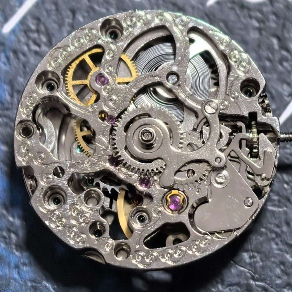 China Made Silver Hollow Mechanical Movement with Silver Rotor Watch Part
