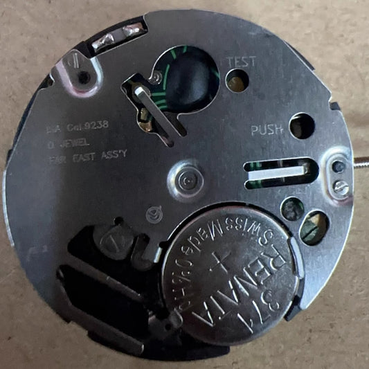 Swiss Made silver ISA 9238 watch movement with quartz 6-hand multifunction for precision timing.